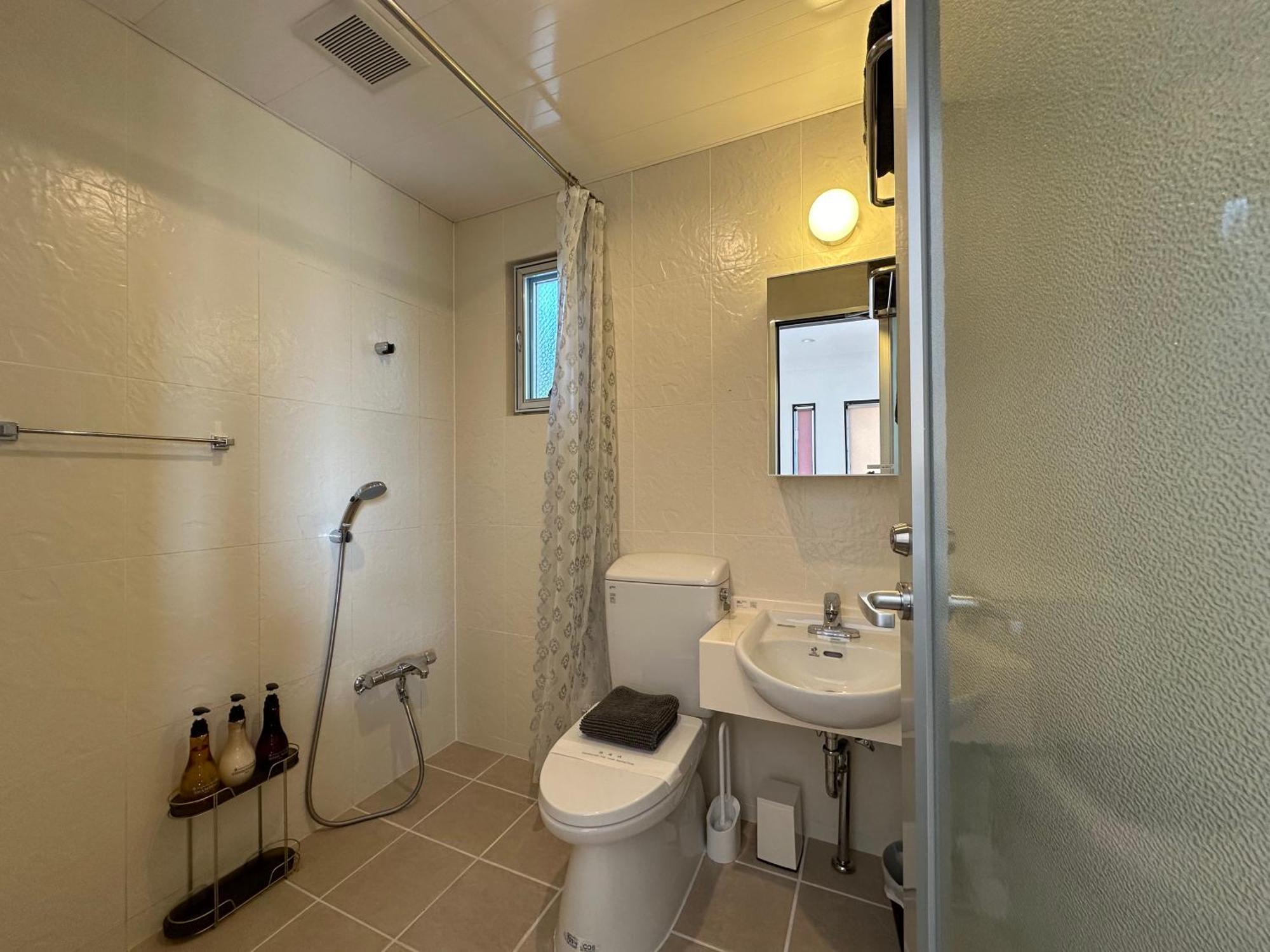 Apartmán White Reef Uruma Exteriér fotografie