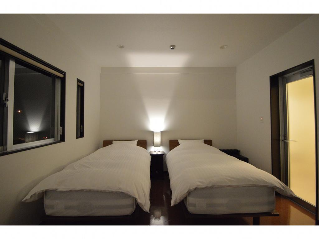 Apartmán White Reef Uruma Exteriér fotografie
